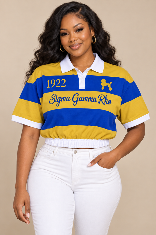 Ooh Soo Crafty LLC cropped rugby shirt in blue and gold stripes with white collar, Greek letters, and elastic hem.
